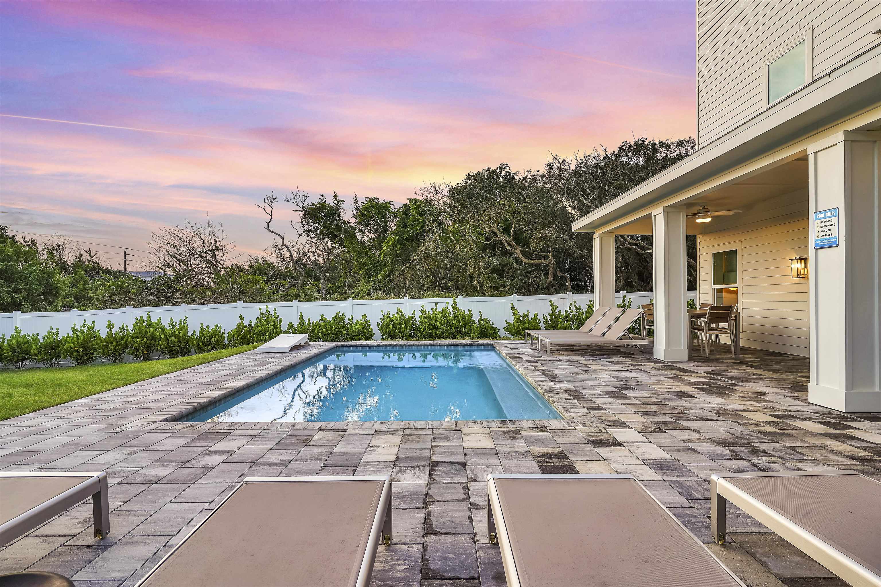 6435 Broward Street St. Augustine, FL 32080 - Photo 45 of 56 a view of a swimming pool with a patio