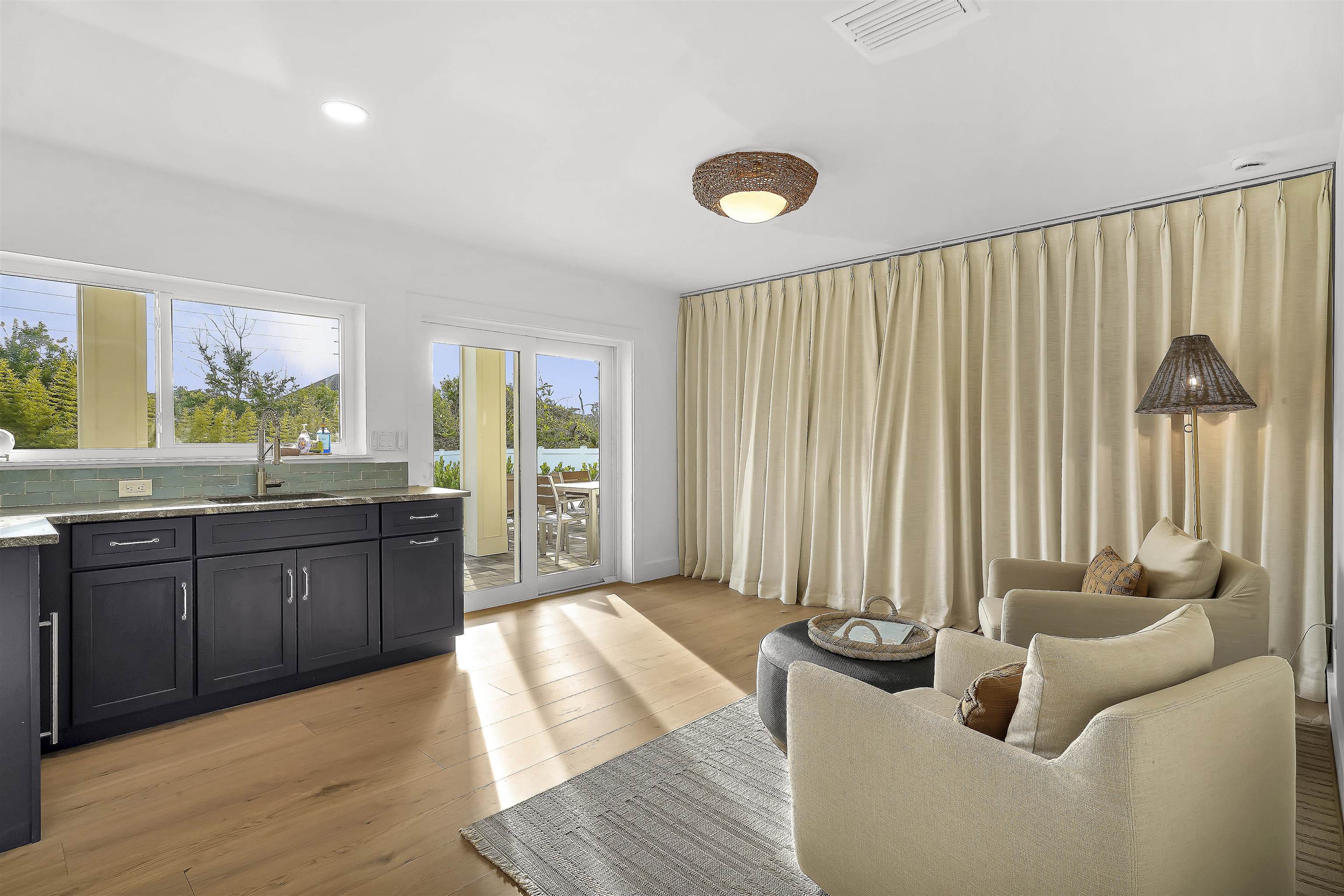 6435 Broward Street St. Augustine, FL 32080 - Photo 10 of 56 a living room with hard wood flooring and furniture
