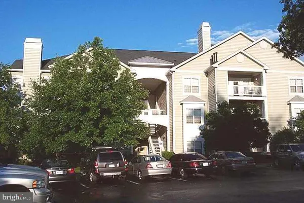 a car parked in front of a house