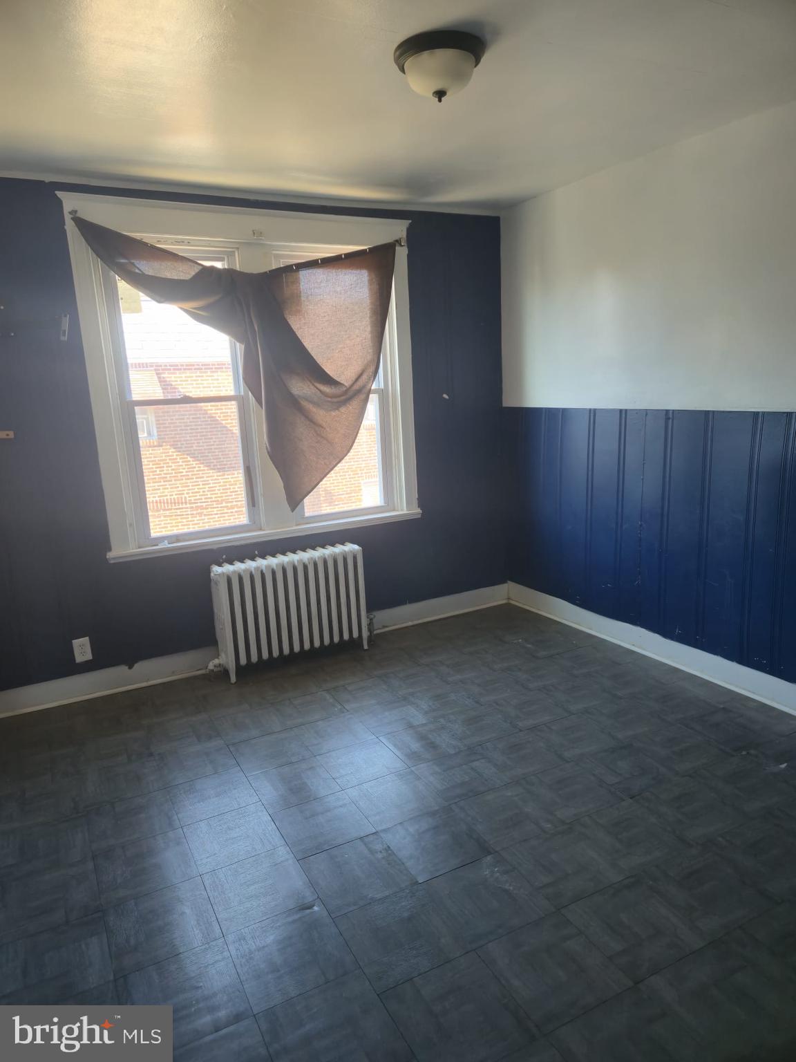 4584 G Street Philadelphia, PA 19120 - Photo 8 of 10 an empty room with a window