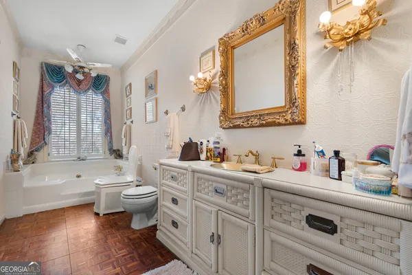 a bed room with a bed and a chair