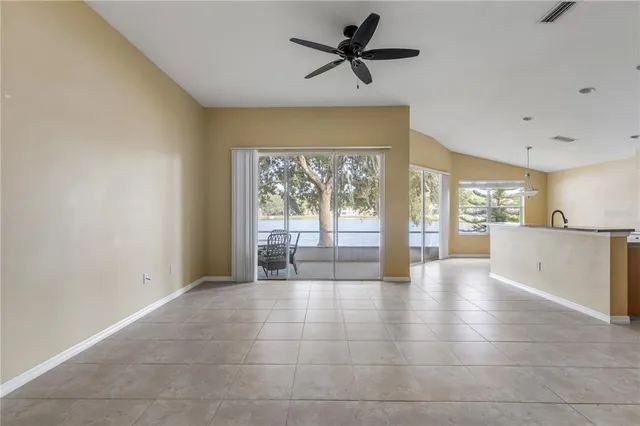 a kitchen with stainless steel appliances a sink stove and cabinets