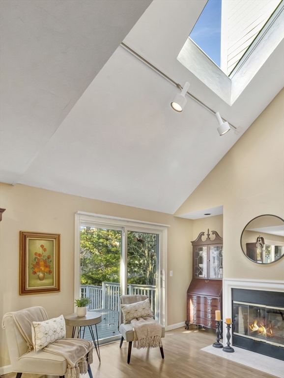 10 Kettle Lane, Unit 10 Mashpee, MA 02649 - Photo 13 of 25 a living room with furniture and a large window