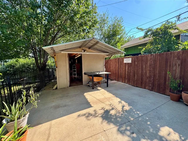 a view of a backyard with a patio