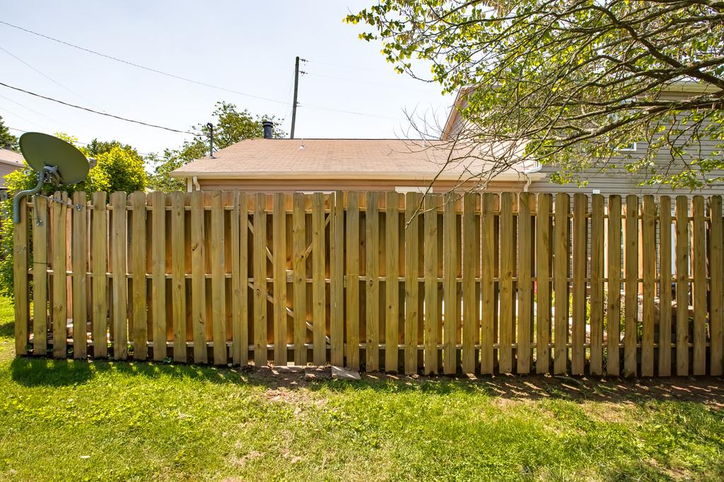 430 Walton Ferry Road, Unit 200 Hendersonville, TN 37075 - Photo 25 of 28 a front view of a house with a garden