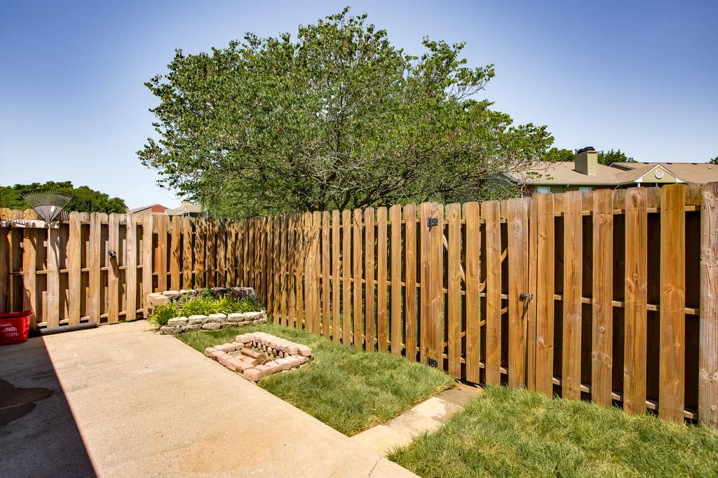 430 Walton Ferry Road, Unit 200 Hendersonville, TN 37075 - Photo 26 of 28 a view of a backyard with wooden fence
