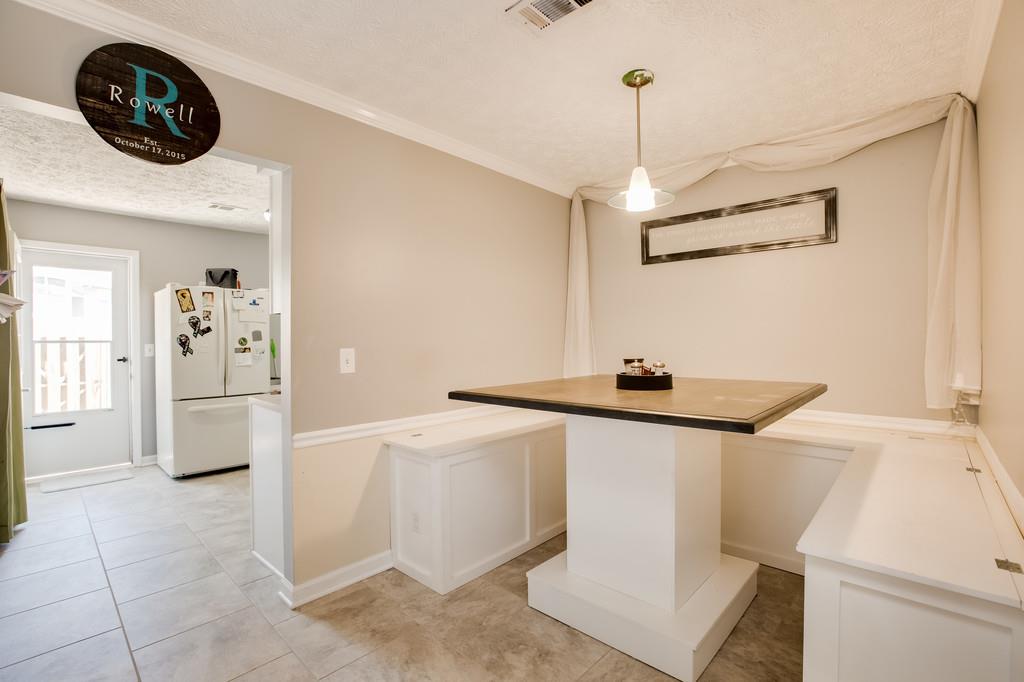 430 Walton Ferry Road, Unit 200 Hendersonville, TN 37075 - Photo 6 of 28 a kitchen with a sink a refrigerator and cabinets