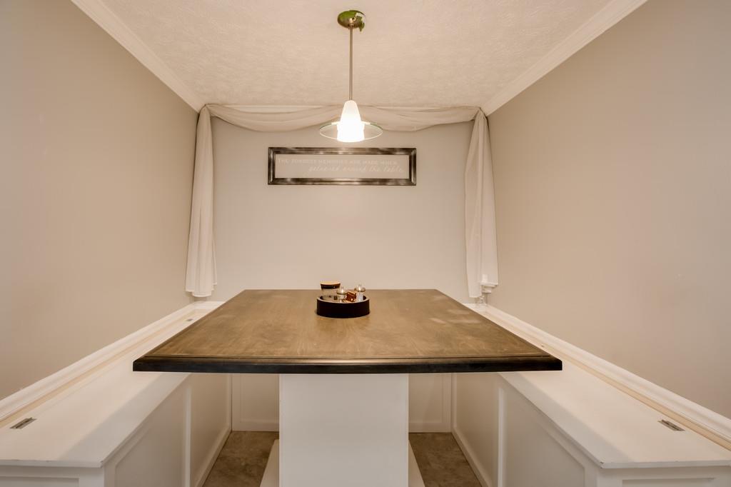 430 Walton Ferry Road, Unit 200 Hendersonville, TN 37075 - Photo 7 of 28 a view of a dining room with a table and chairs