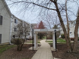 a view of a building with a yard