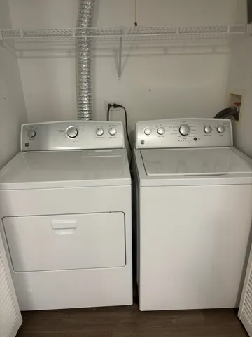 a bathroom with a sink vanity and mirror