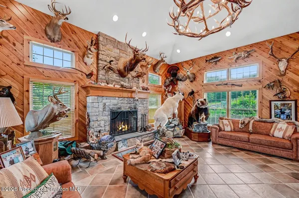 a kitchen with stainless steel appliances granite countertop a stove a sink dishwasher and a refrigerator