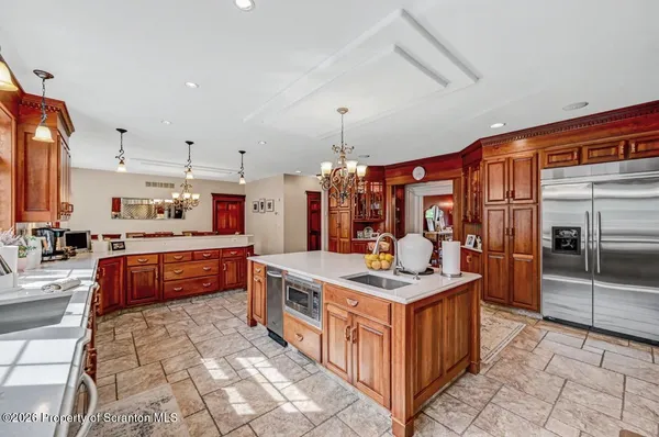 a view of livingroom with hardwood floor and a ceiling fan