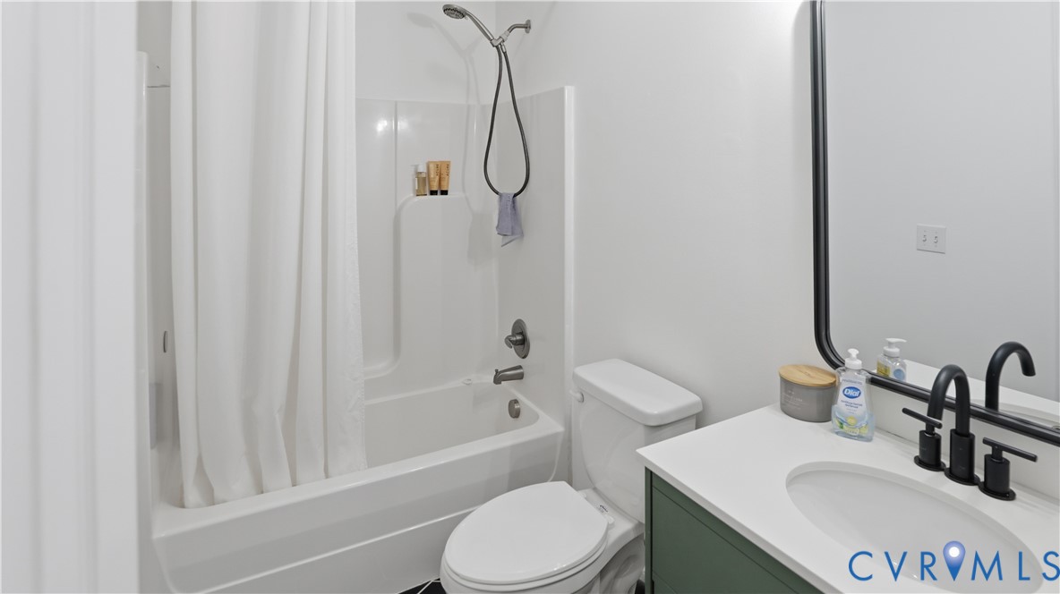 2406 Emanuel Church Road Powhatan, VA 23139 - Photo 30 of 48 Bathroom featuring a white tub/shower combination