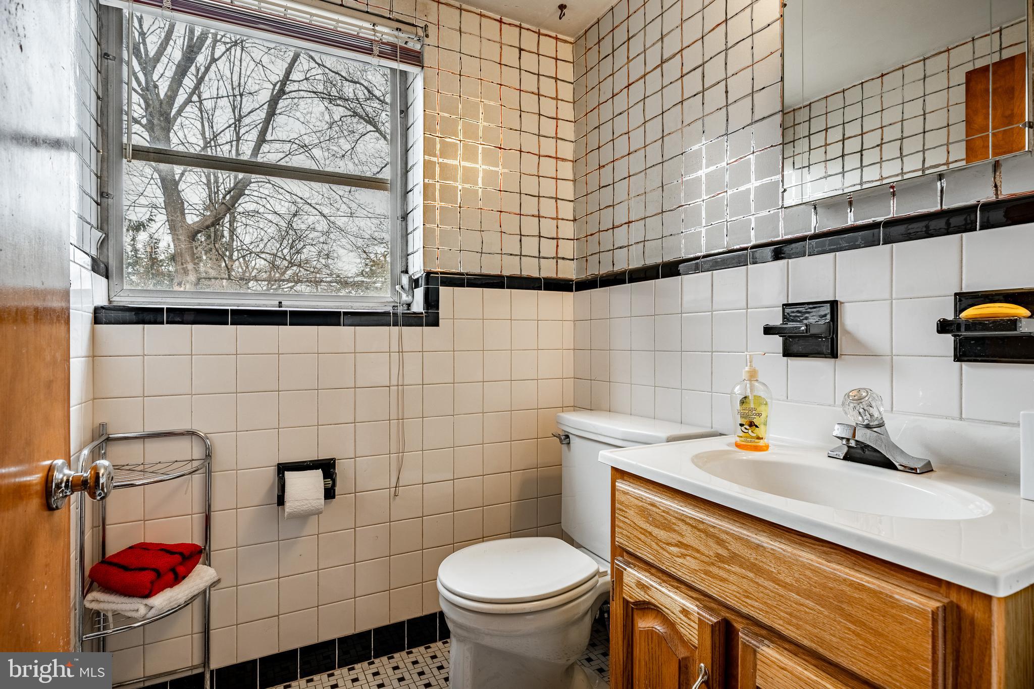 140 Ashley Road Newtown Square, PA 19073 - Photo 30 of 44 a bathroom with a toilet and a sink