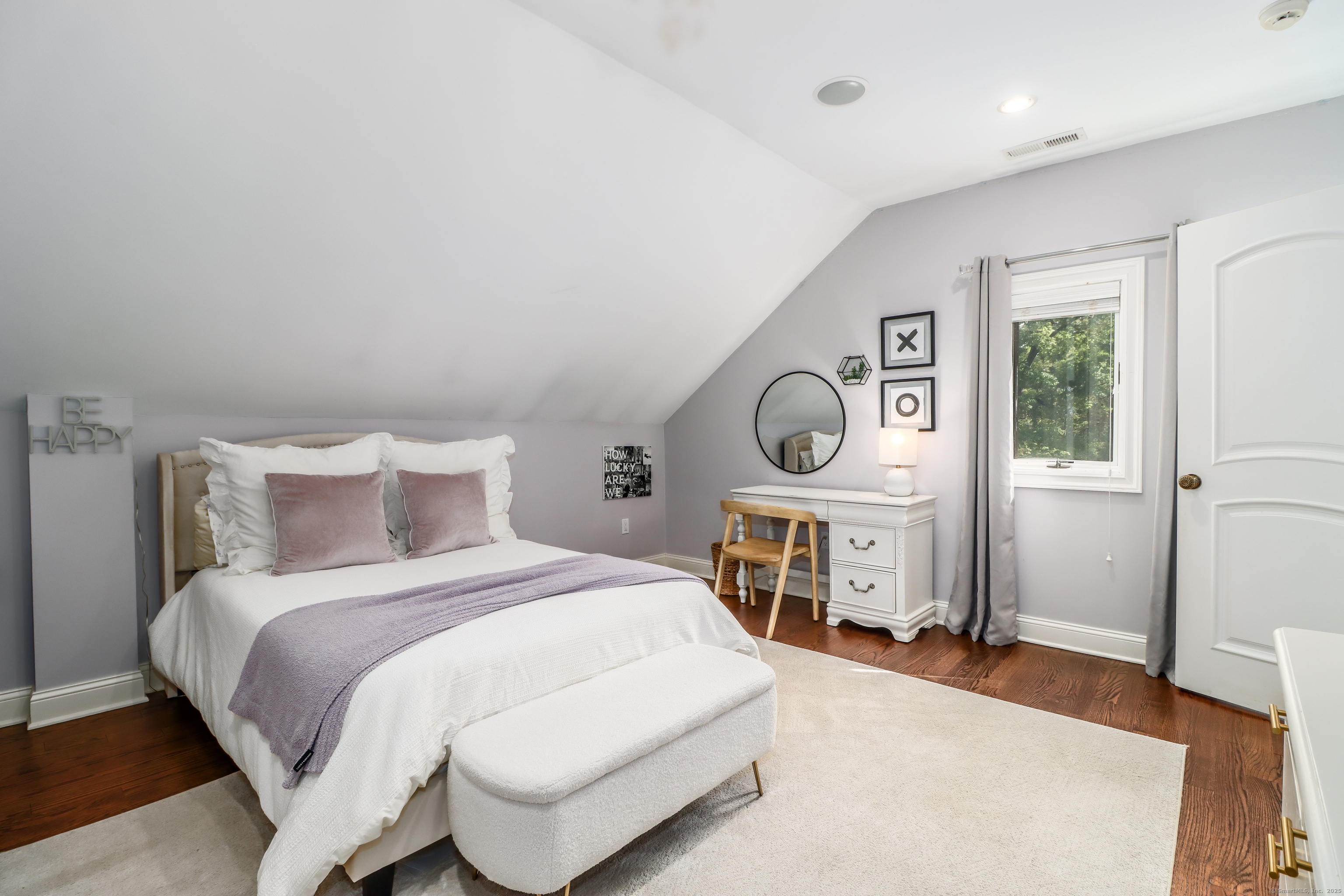 70 Obtuse Hill Road Brookfield, CT 06804 - Photo 22 of 37 a bedroom with a bed and a table in it