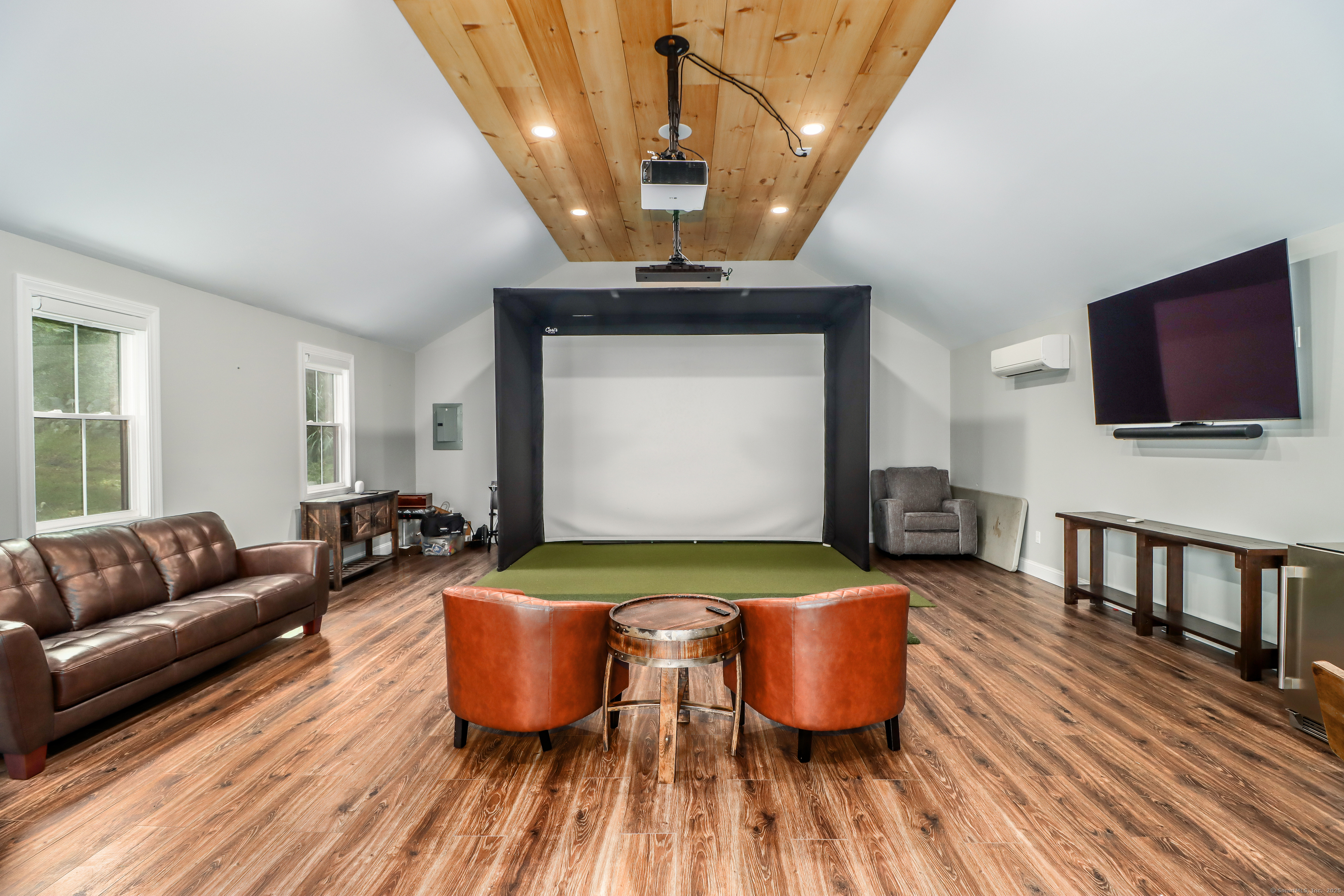 70 Obtuse Hill Road Brookfield, CT 06804 - Photo 26 of 37 a living room with furniture and a flat screen tv