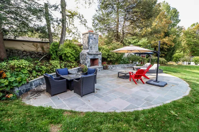 a view of outdoor space yard deck patio and fire pit