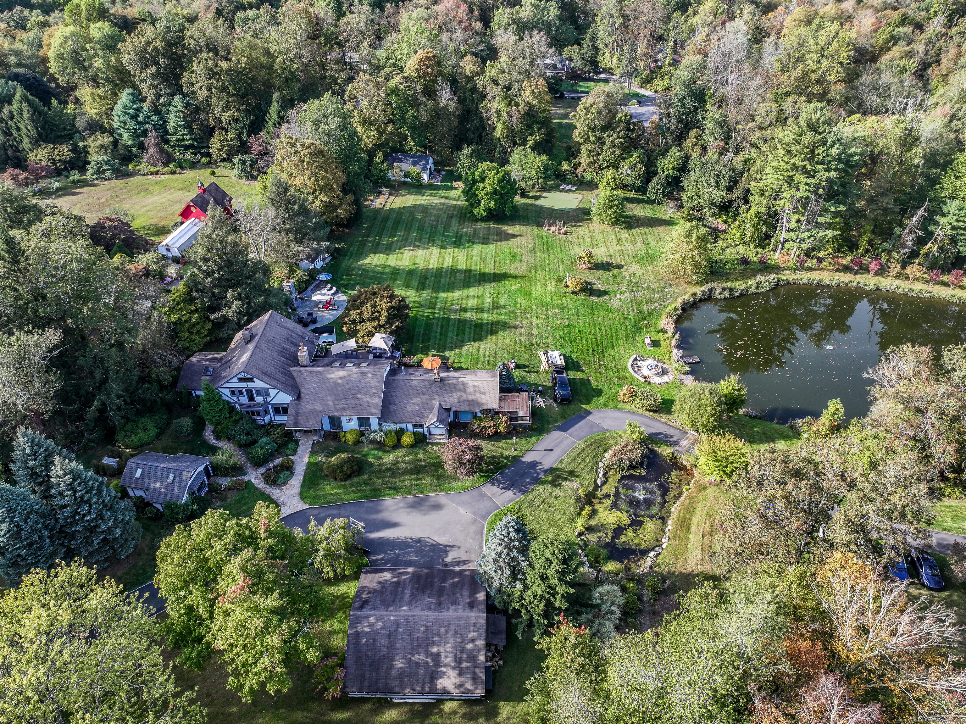 70 Obtuse Hill Road Brookfield, CT 06804 - Photo 37 of 37 an aerial view of a house with a yard and lake view