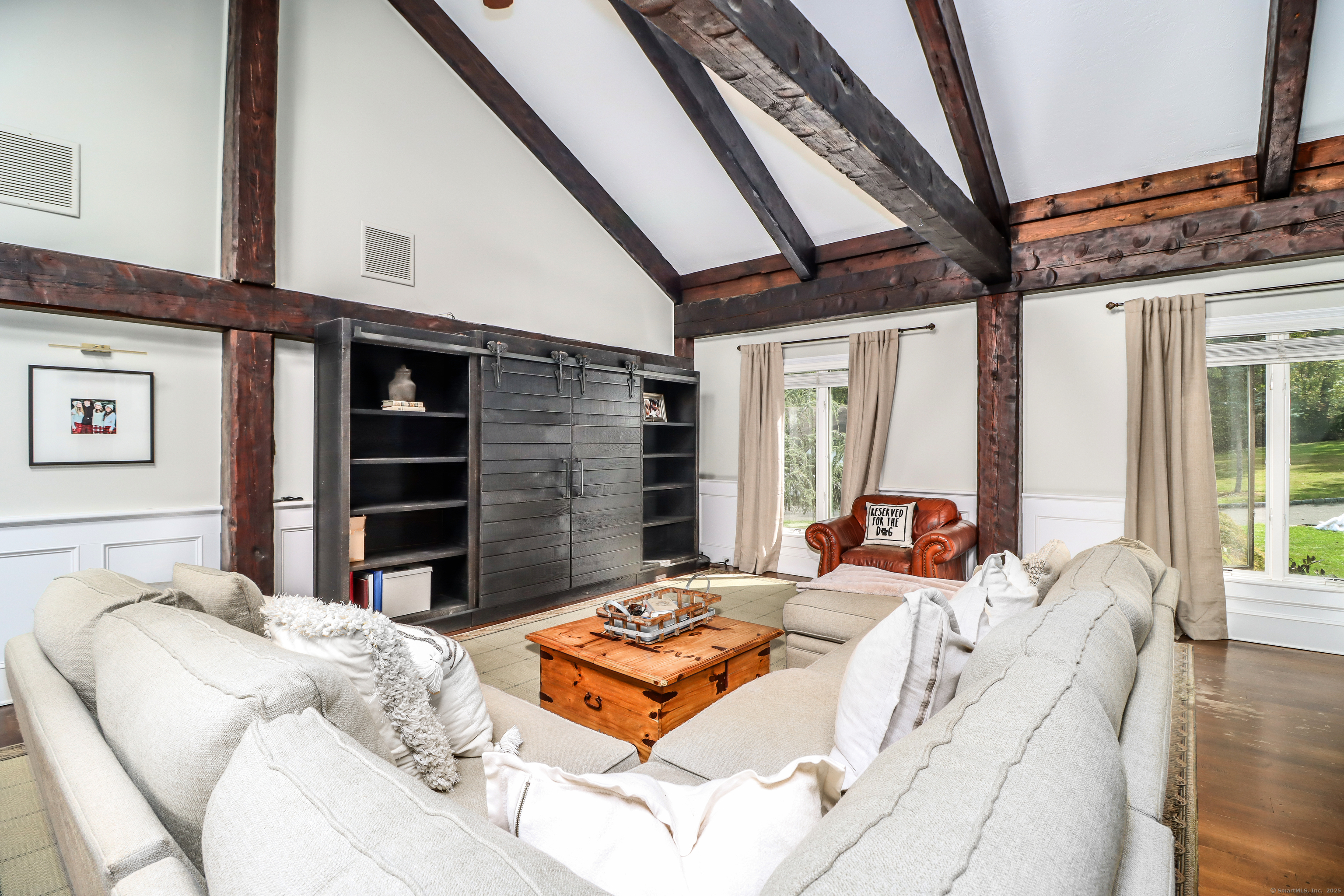 70 Obtuse Hill Road Brookfield, CT 06804 - Photo 7 of 37 a bed sitting in a bedroom next to a window