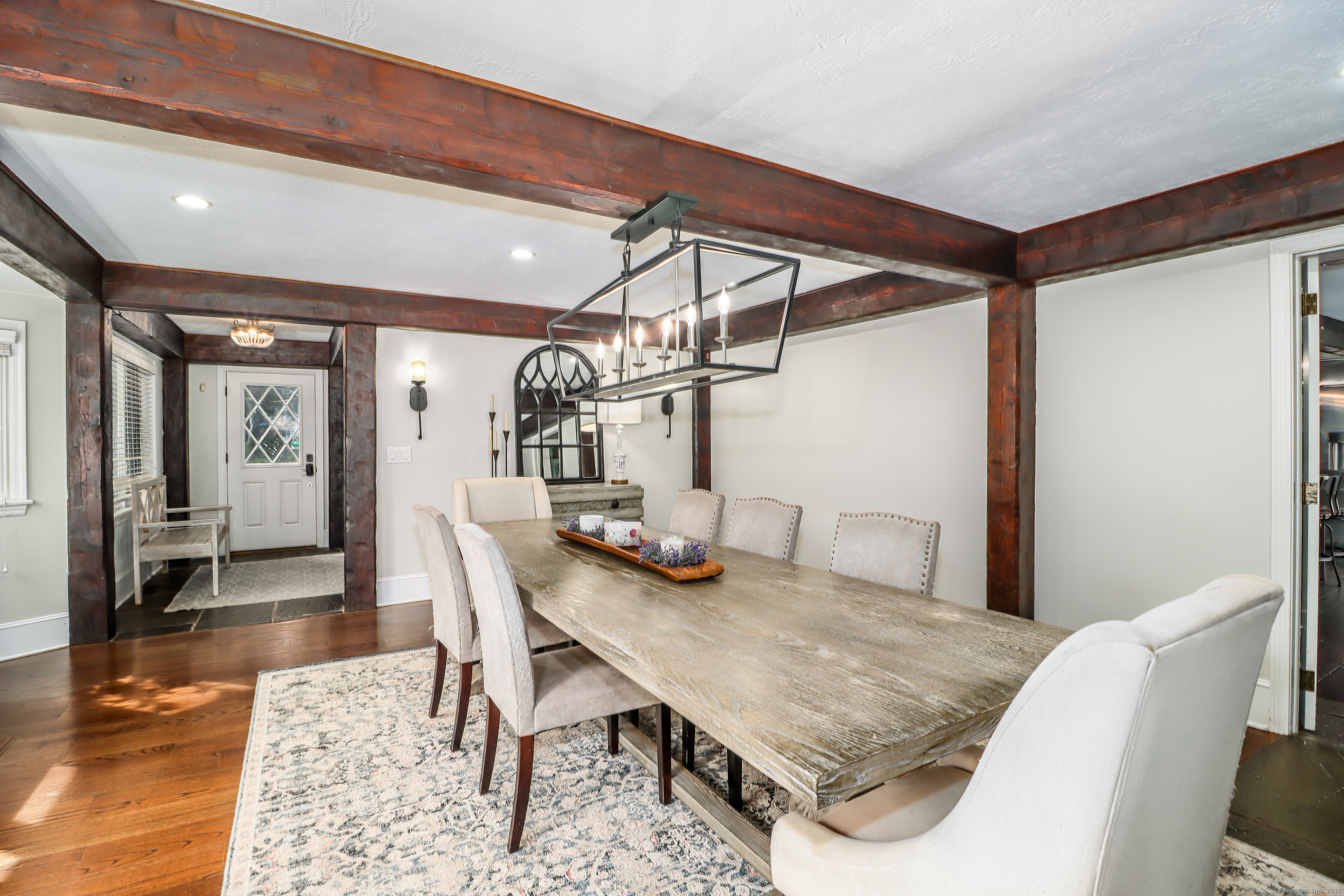 70 Obtuse Hill Road Brookfield, CT 06804 - Photo 10 of 37 a view of a dining room with furniture and wooden floor