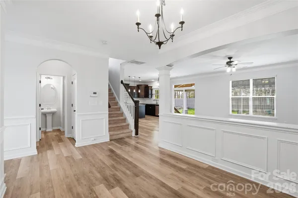a view of a kitchen with a sink and dishwasher