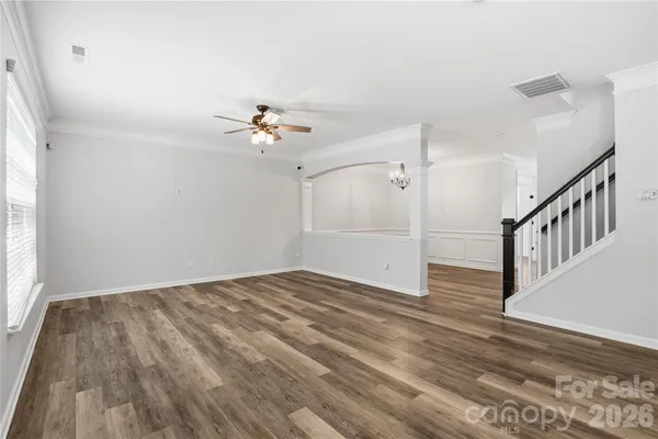 a view of a kitchen with microwave and cabinets