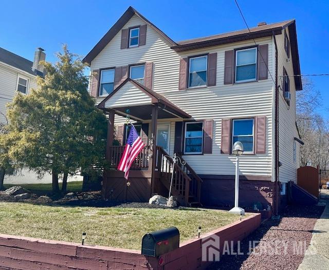 a view of house with outdoor seating space