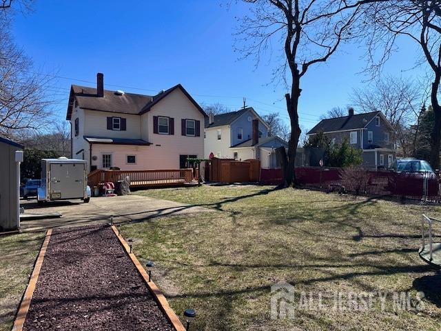 111 Main Street Helmetta, NJ 08828 - Photo 14 of 42 a front view of a house with a yard