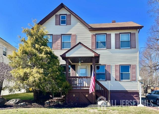 111 Main Street Helmetta, NJ 08828 - Photo 2 of 42 a front view of a house with a yard