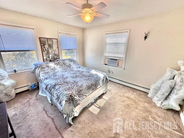 111 Main Street Helmetta, NJ 08828 - Photo 28 of 42 a bed sitting in a bedroom next to a window