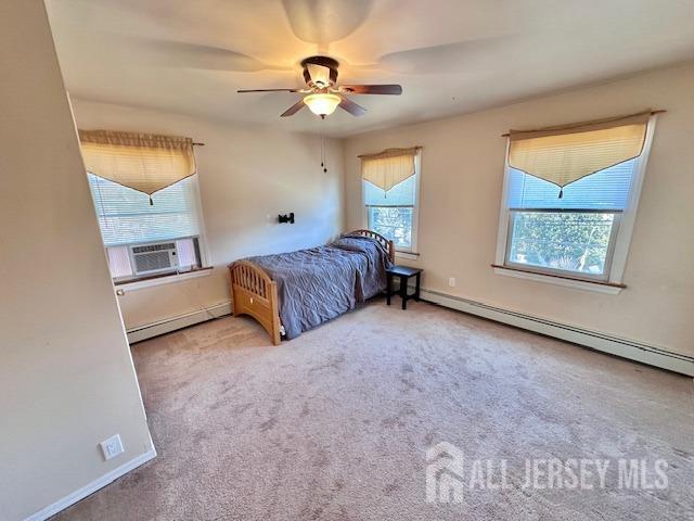 111 Main Street Helmetta, NJ 08828 - Photo 29 of 42 a living room with a bed furniture and a window