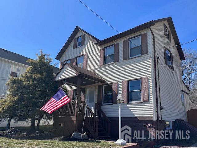 111 Main Street Helmetta, NJ 08828 - Photo 4 of 42 a front view of a house with garden