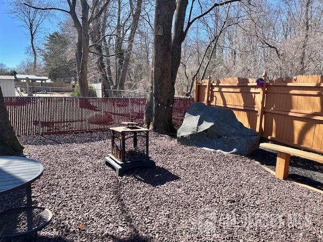 111 Main Street Helmetta, NJ 08828 - Photo 10 of 42 a view of a backyard with sitting area