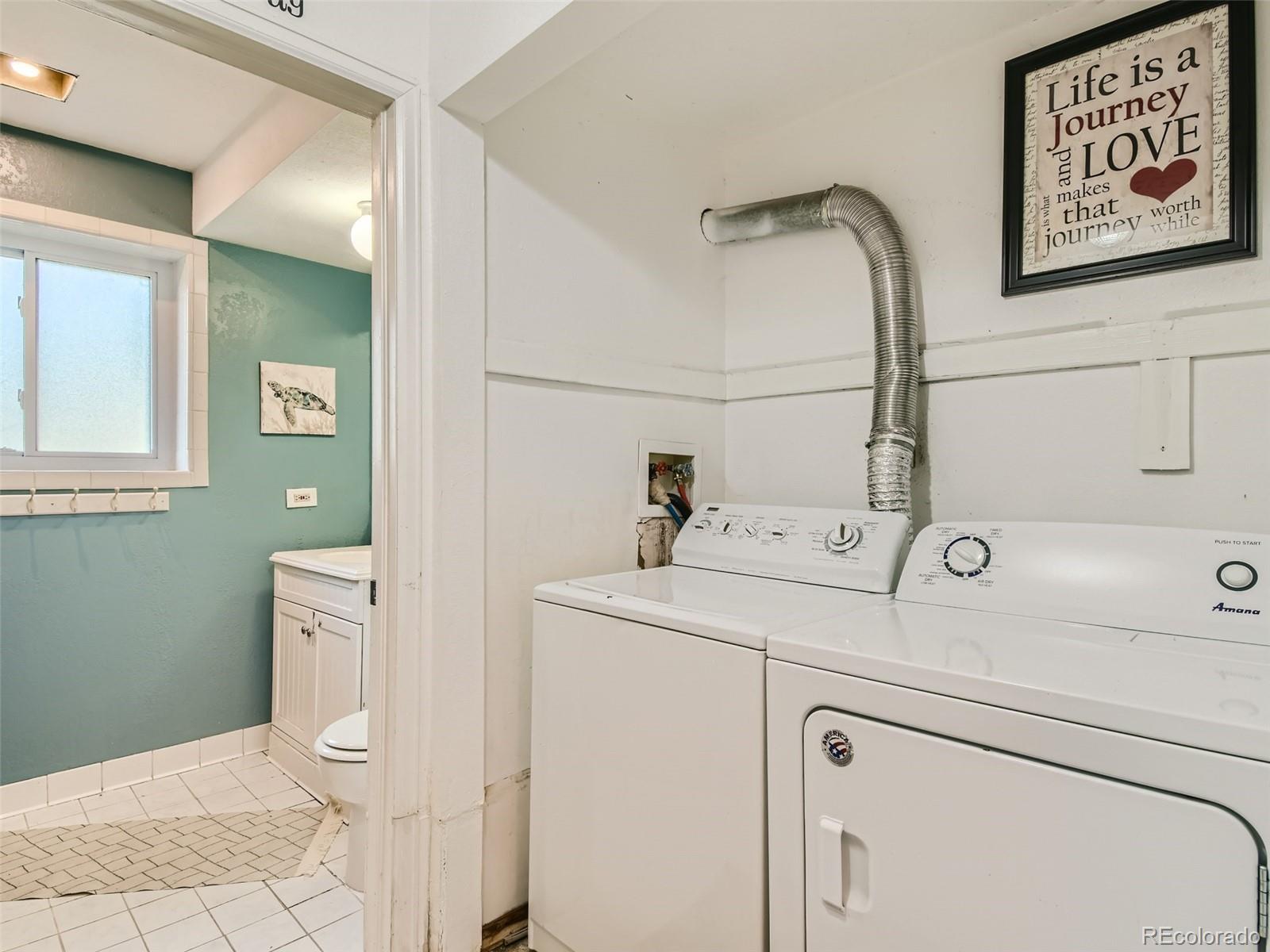 11111 Hudson Place Thornton, CO 80233 - Photo 23 of 28 a utility room with dryer and washer
