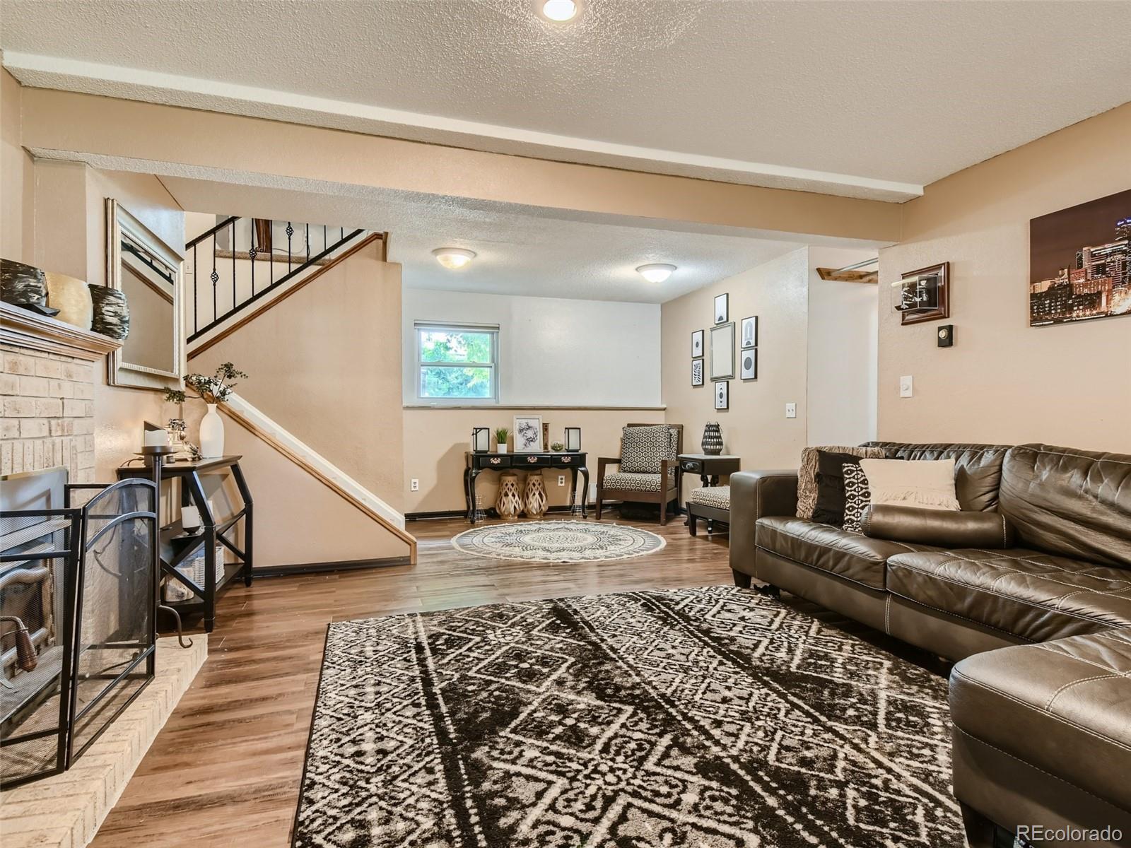 11111 Hudson Place Thornton, CO 80233 - Photo 24 of 28 a living room with furniture