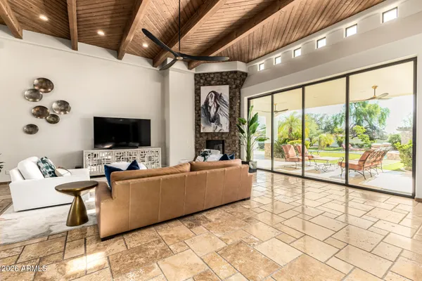 a view of a storage and utility room with washer and dryer