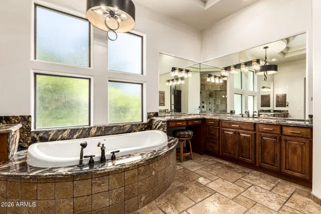a utility room with sink dryer and washer