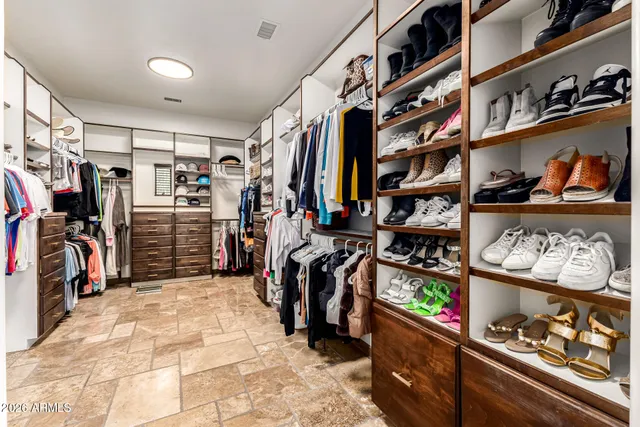 a view of yard with swimming pool and green space