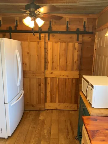 a view of a refrigerator in a house