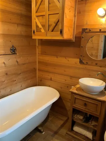 a bathroom with a sink and a bathtub