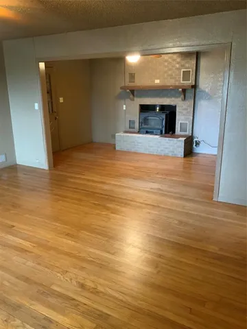 a view of hall with wooden floor