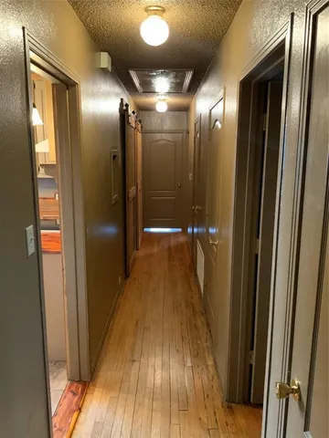 a view of gallery with hallway