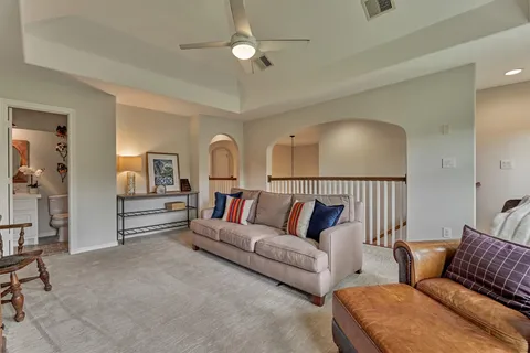 a bedroom with a bed and dresser