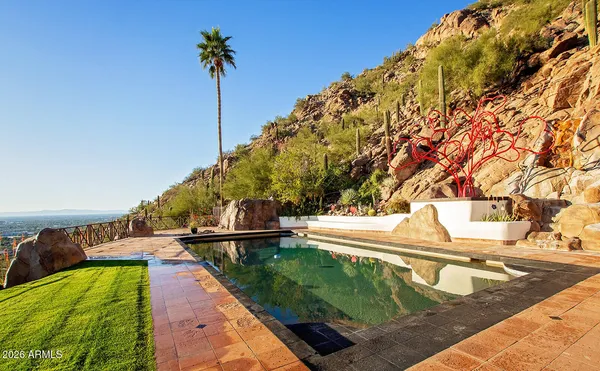 a kitchen with stainless steel appliances granite countertop a stove and a sink