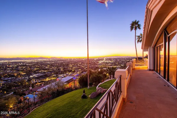a view of a terrace with sitting area