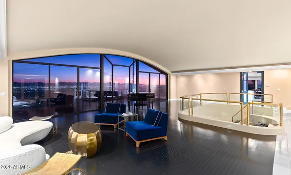 a view of a swimming pool with a yard