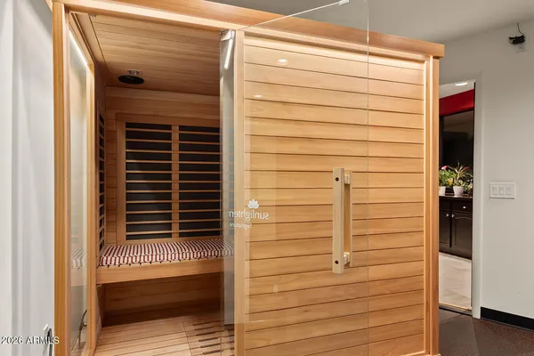 a front view of a house with a yard table and chairs