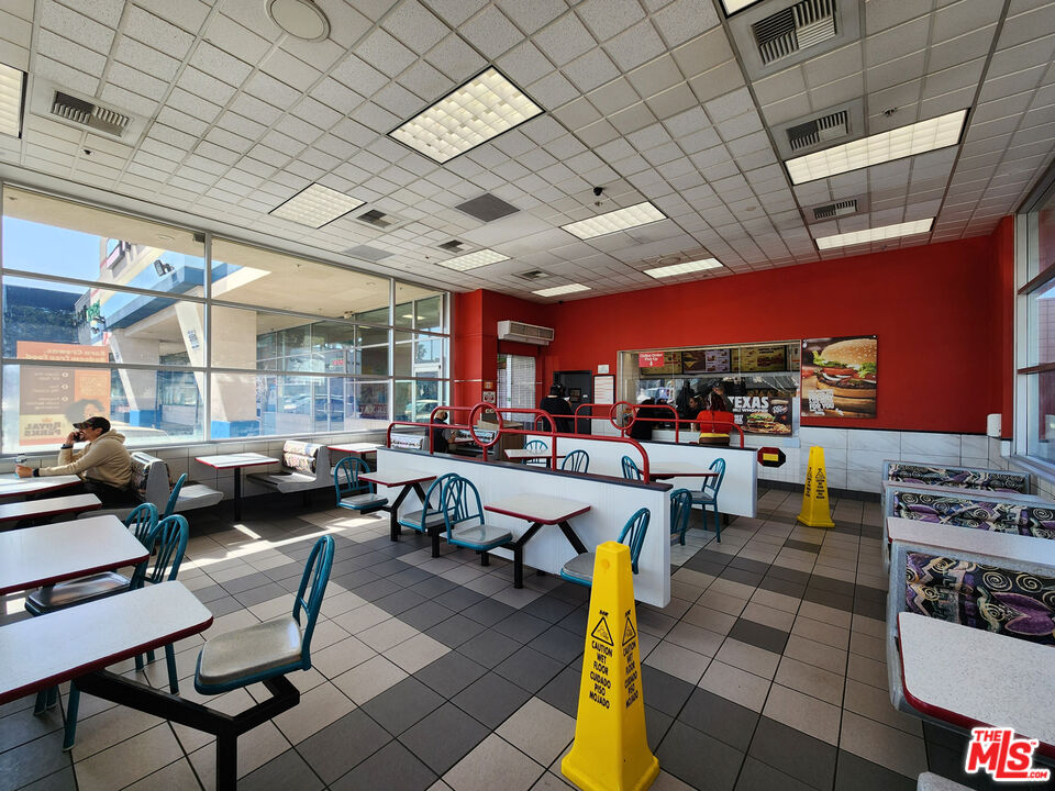 5609 West Sunset Boulevard Los Angeles, CA 90028 - Photo 7 of 8 a group of people sitting in a room