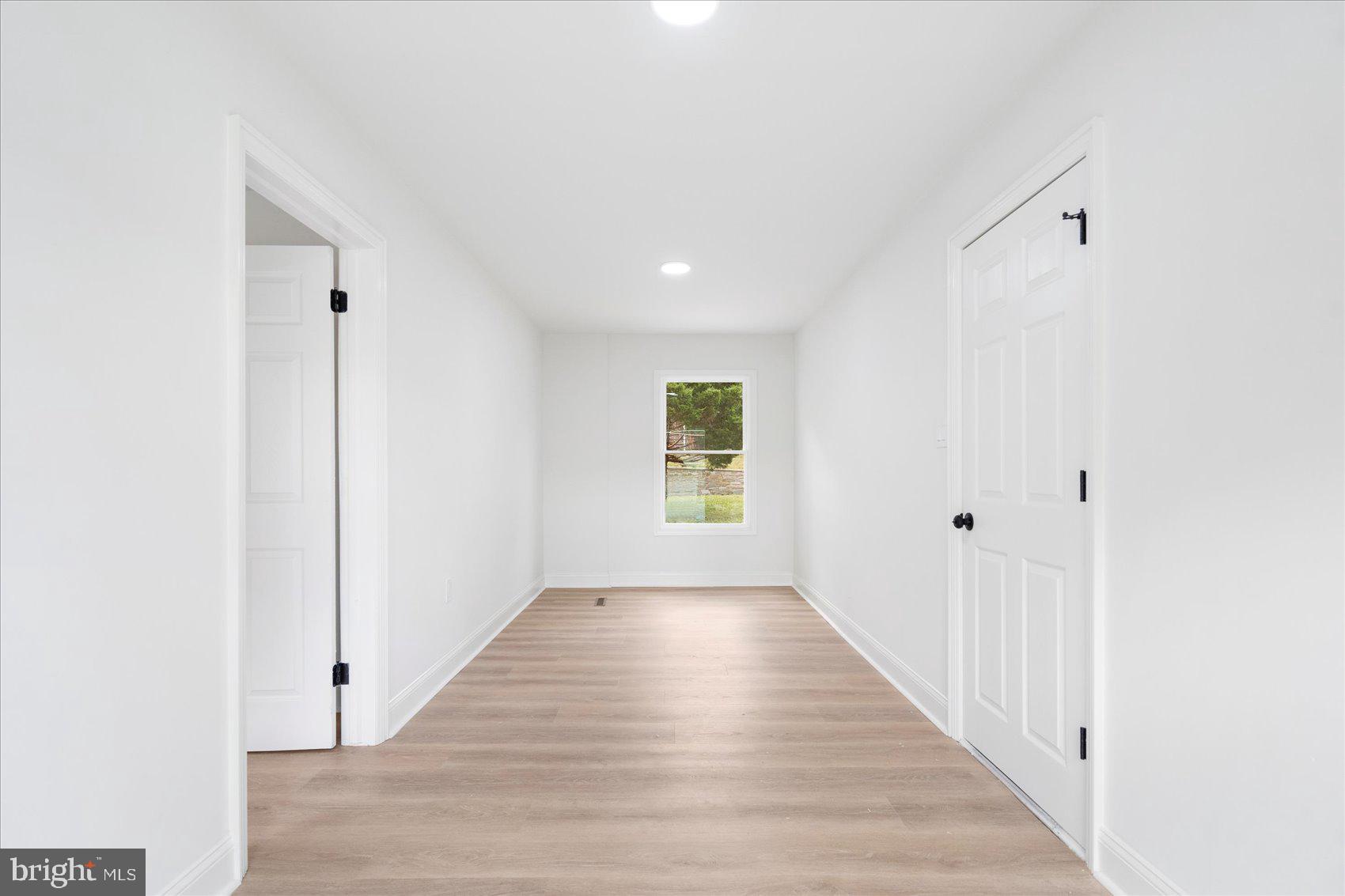 226 Mt Royal Avenue Aberdeen, MD 21001 - Photo 11 of 48 a view of a hallway with wooden floor