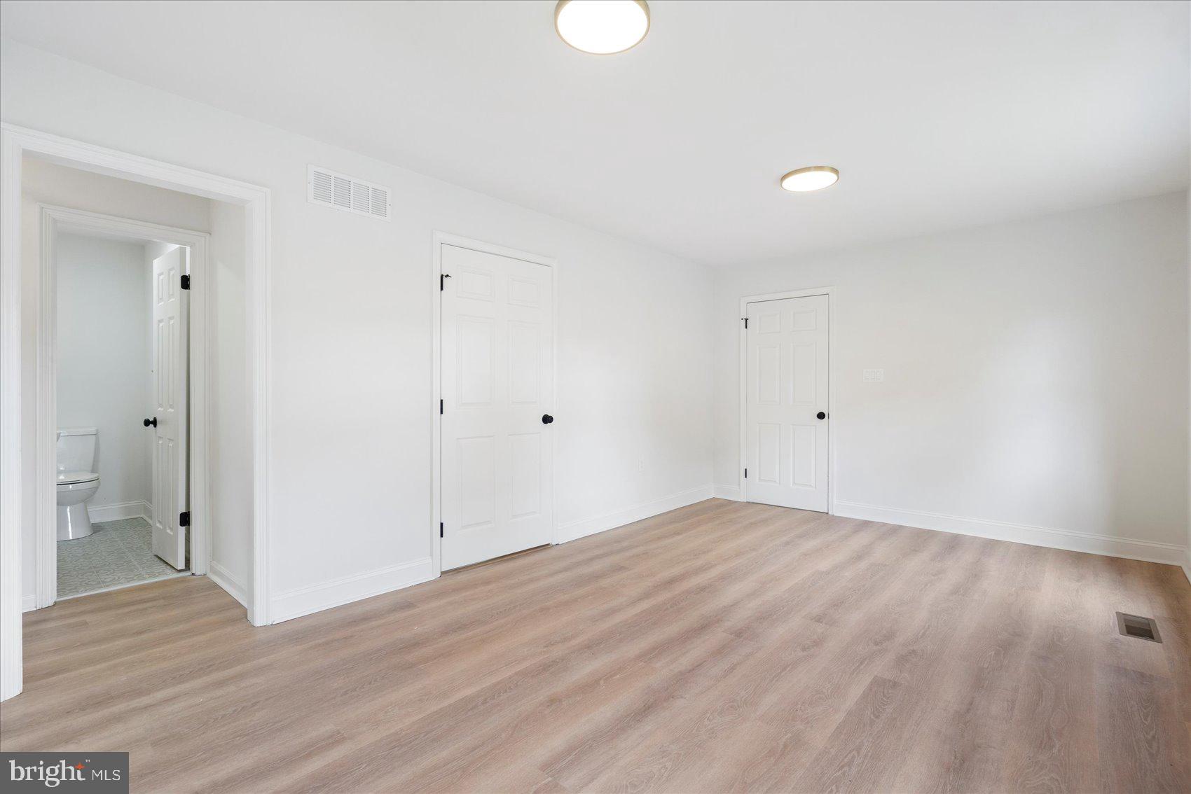 226 Mt Royal Avenue Aberdeen, MD 21001 - Photo 15 of 48 wooden floor in an empty room with a window